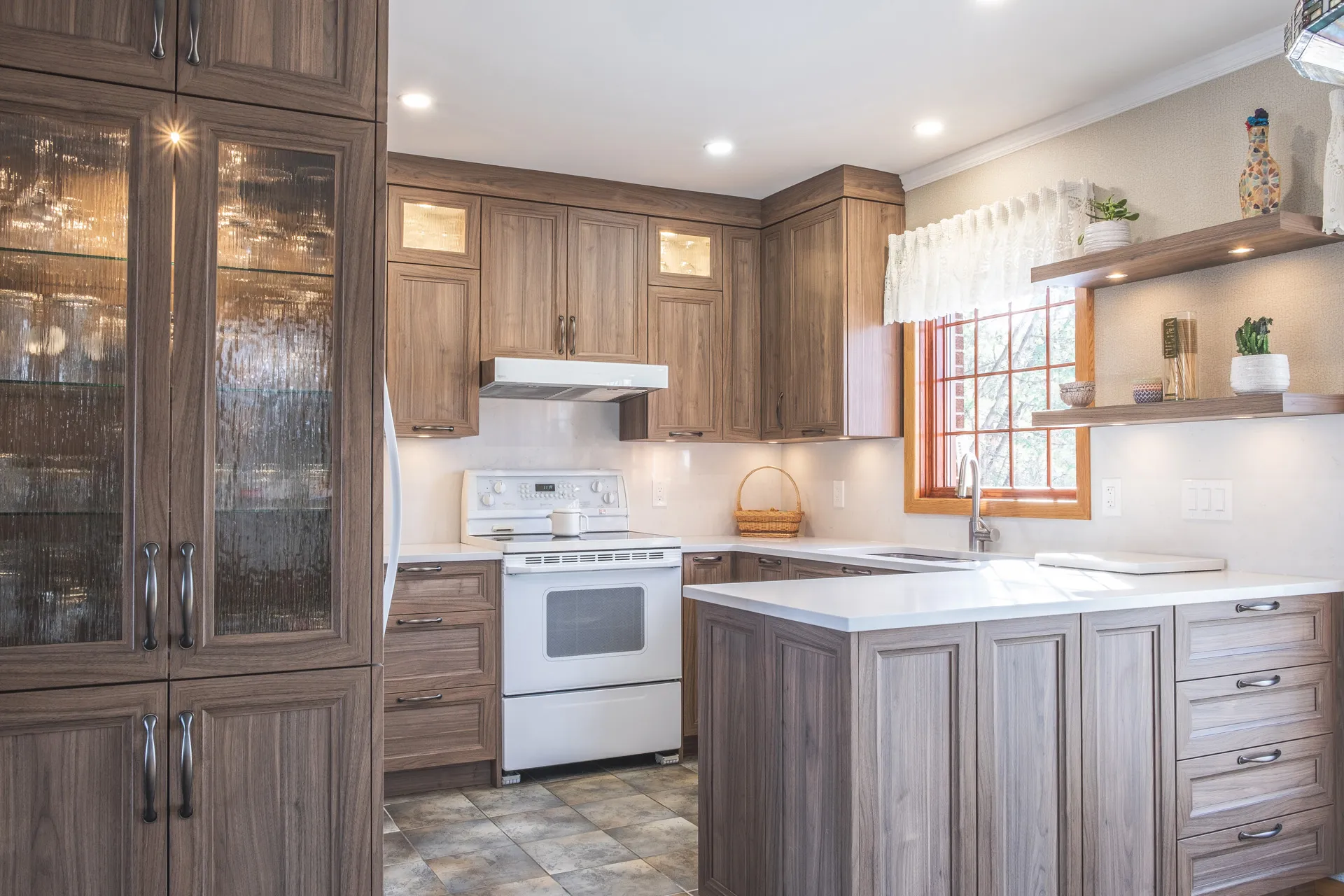 Nadon Kitchen Rosemere: textured walnut cabinets, white countertop, island, white backsplash, white appliances