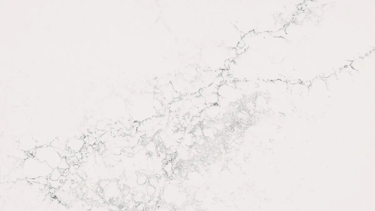 Close-up of a white quartz countertop with veining