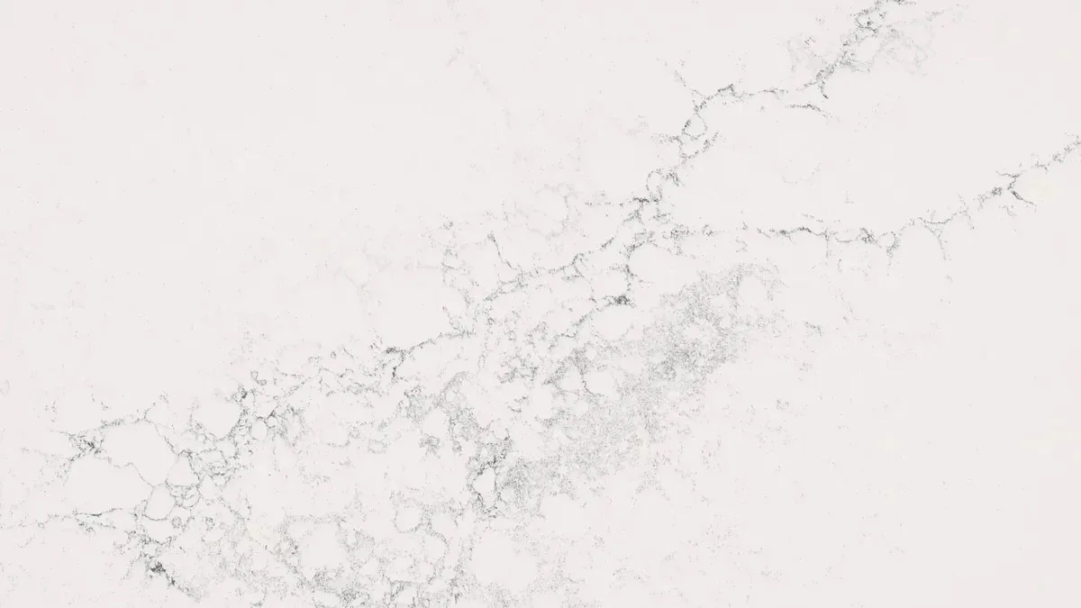 Close-up of a white quartz countertop with veining